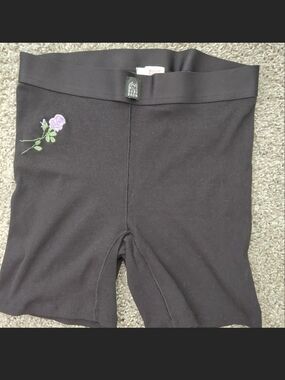 Millie Bobby Brown Ribbed Bike Shorts with Purple Rose Embroidery
